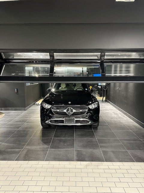 DWS Doorwall quad installed at the Mercedes Benz dealership in New York City Mercedes-Benz Manhattan delivery bay DoorWall installation DWS